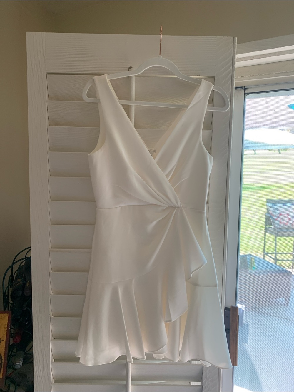 cinq a sept White Sleeveless V-Neck Ruffle Wrap Mini Dress